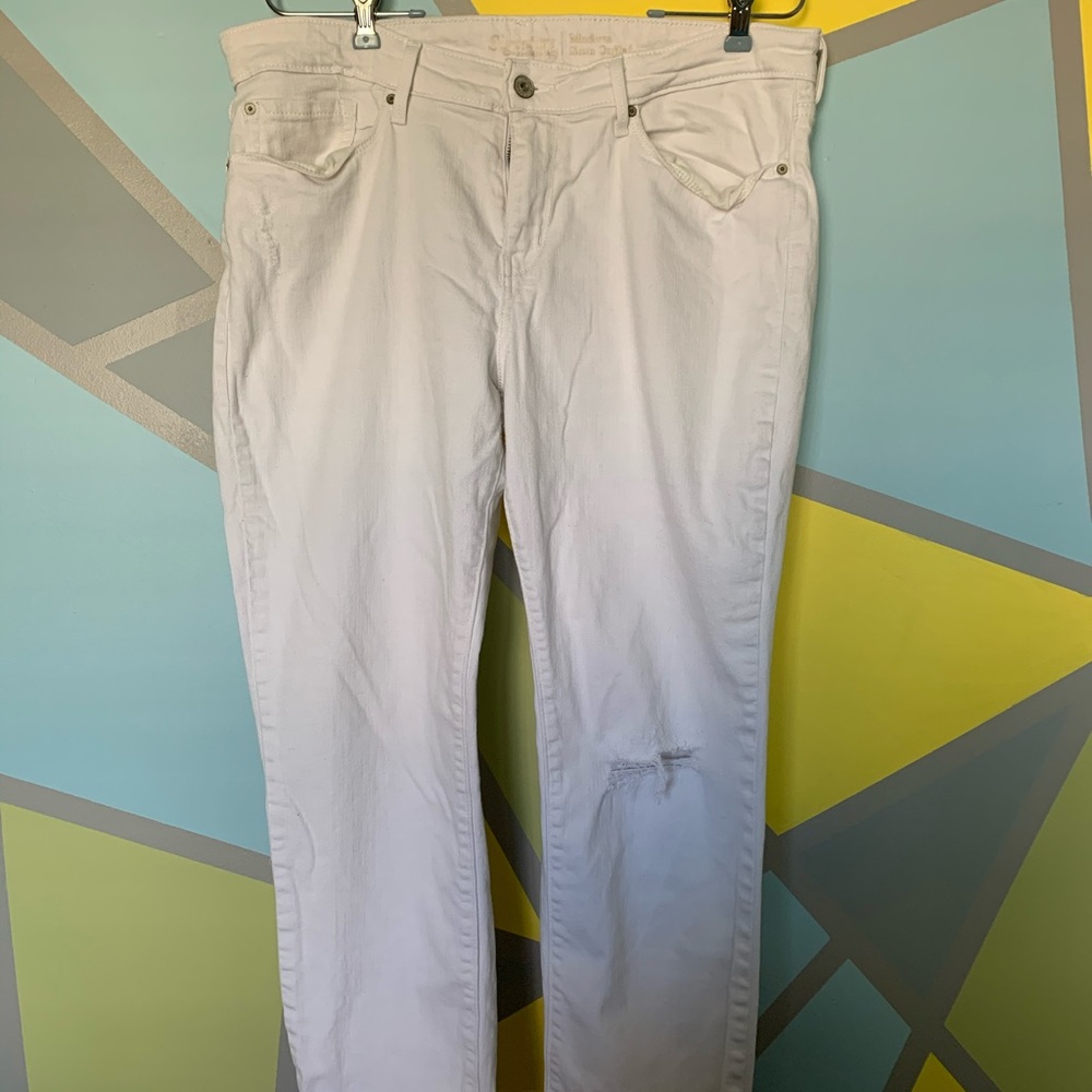 Distressed white Levi Strauss Jeans